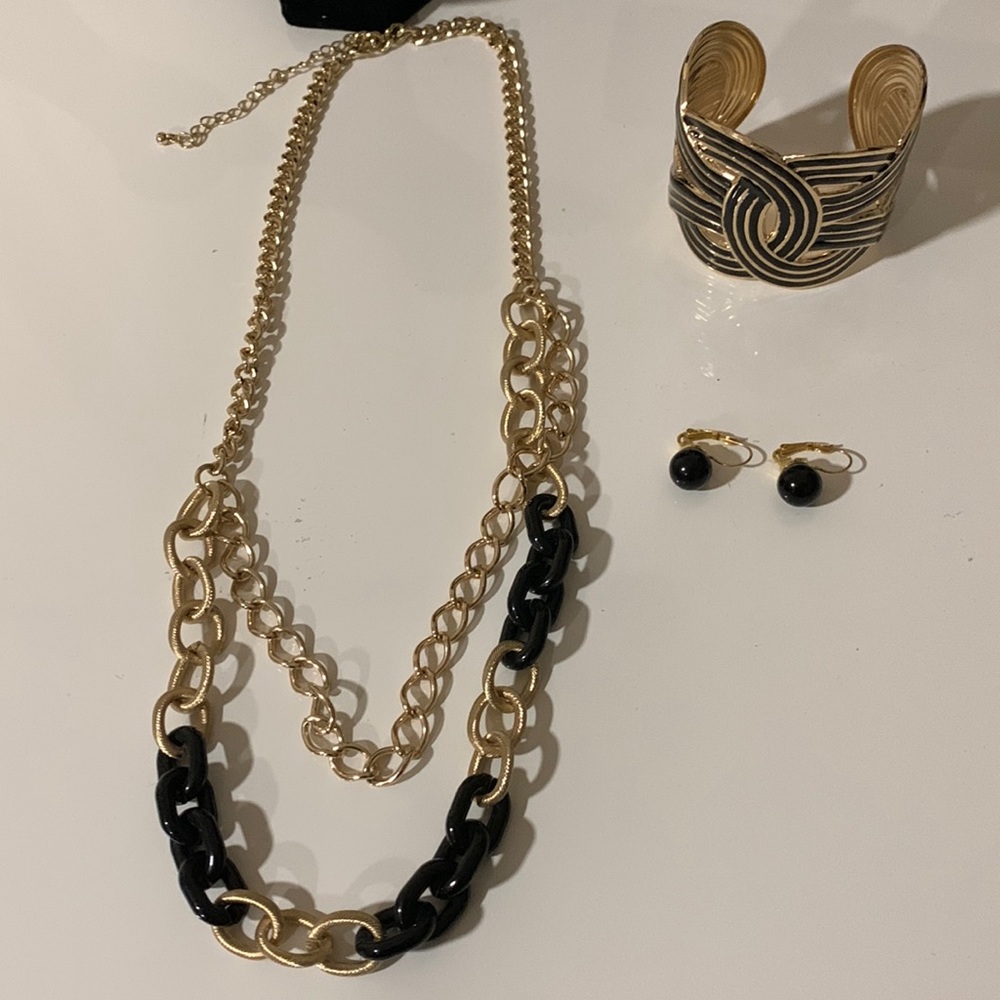 Necklace,bracelet and earrings.Gold tone with black‎